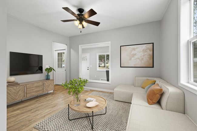 A virtually staged photo of the living room. | Image 8