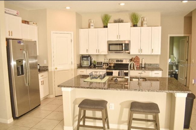 16623 Carlton Pond St, House other with 4 bedrooms, 2 bathrooms and null parking in Wimauma FL | Image 13
