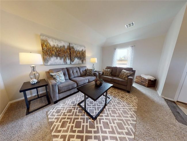 Living room featuring vaulted ceiling and carpet flooring | Image 6
