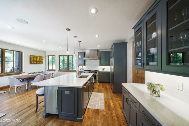 Updated Kitchen With Slab Countertops and New Appliances | Image 21