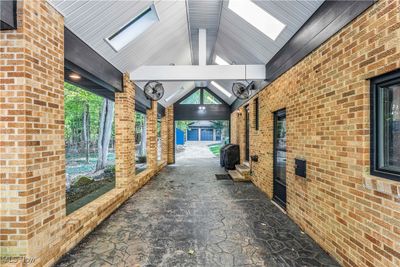 The MOST amazing Car Port EVER - you will never need to worry about a raining day - Skylights and fans make this and exceptional addition - play corn hole year round - set up tables and invite the whole neighborhood for a sit down feast - LEADS to OUTBUILDING and Shed | Image 2