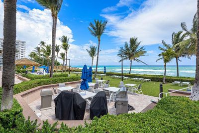 Located right on the ocean and just steps from the sand with resort style amenities | Image 1