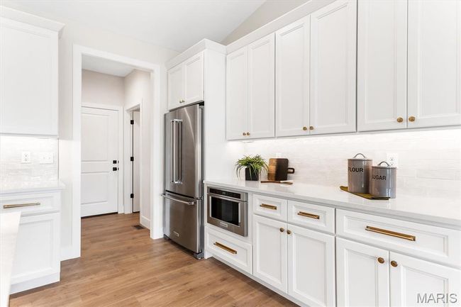Plenty of cabinet space, built-in microwave and refrigerator included! | Image 20