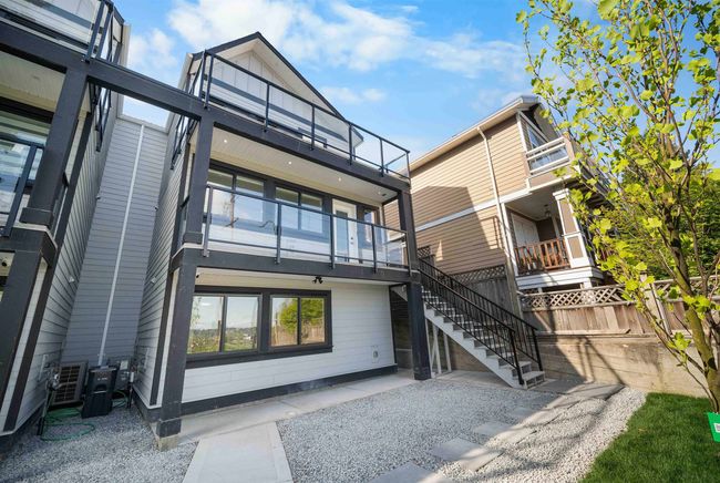 Back of property featuring stairs | Image 33