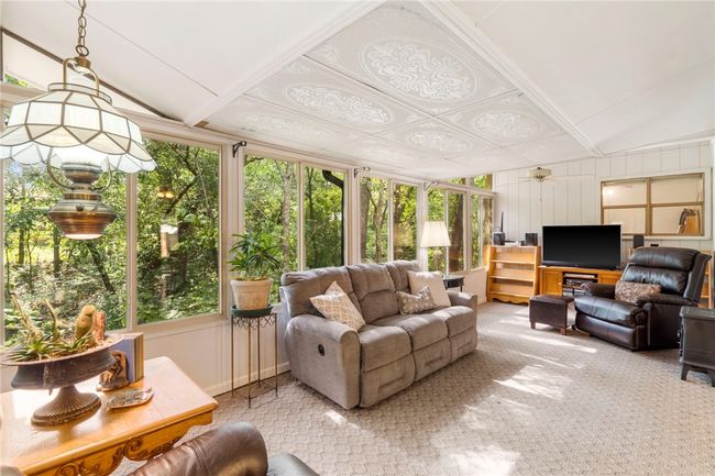 Additional living area/ Parlor/ Sun/ Shade room. | Image 12