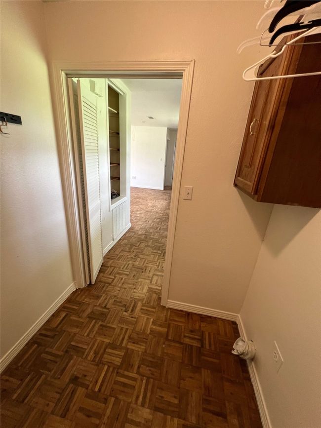 Hallway featuring baseboards | Image 5