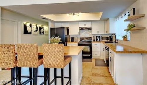 319 Se 24th Ave, Cape Coral, FL, 33990-1450 | Card Image