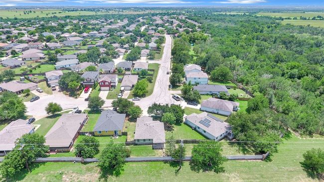 Aerial view of the home to show half cul-de-sac to lead into the culdasac | Image 31