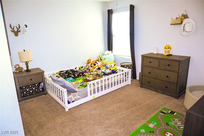 Bedroom with carpet floors | Image 20