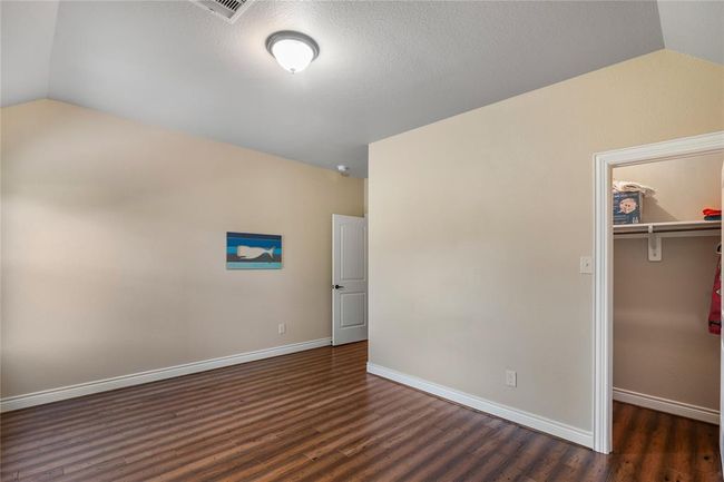 View of the walk-in closet. | Image 34