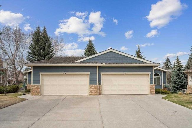 89 Shawnee Rise Sw, Home with 3 bedrooms, 3 bathrooms and 4 parking in Calgary AB | Image 2