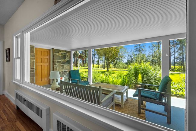 Huge picture window in living room for plenty of natural light | Image 10