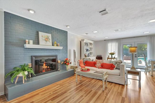 Gas log fireplace offers peace and tranquility on chilly nights. | Image 11