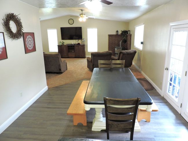 Dining Open to Great Room with Vaulted Ceilings | Image 15