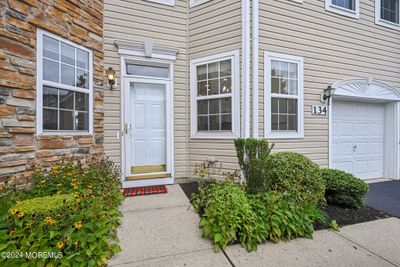 134 Shinnecock Drive, Condo with 4 bedrooms, 2 bathrooms and null parking in Manalapan NJ | Image 1