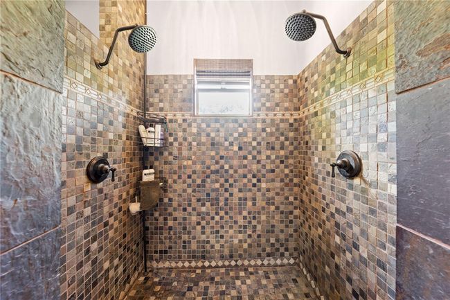 Main Home - Primary Bathroom with double shower heads. | Image 50
