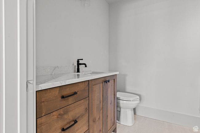 Half bath featuring toilet and vanity | Image 28