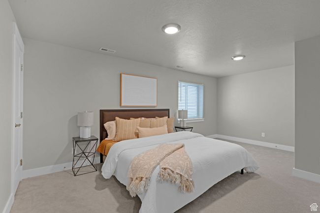Bedroom with light carpet | Image 15