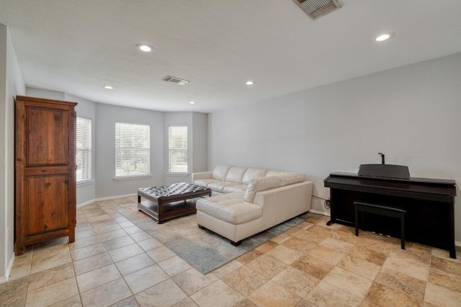 Living room with recessed lighting and baseboards | Image 12