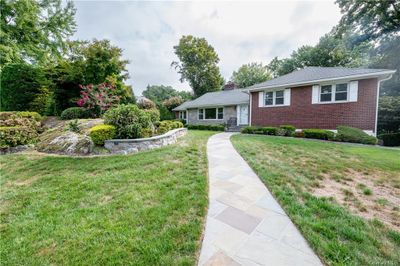 View of front of property featuring a front yard | Image 1