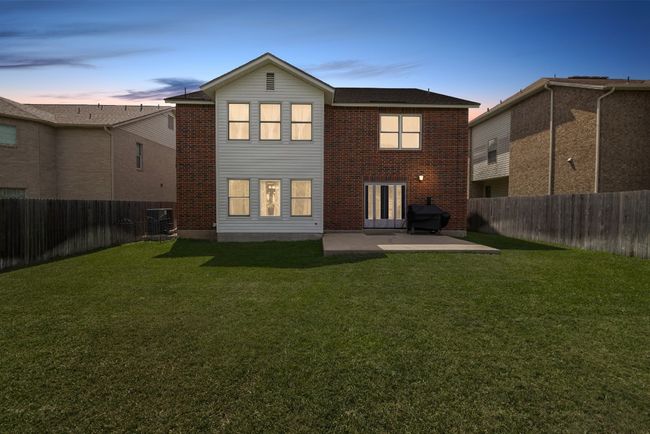 With ample space and a blank-slate feel, the backyard is ready for your personal touch. | Image 33