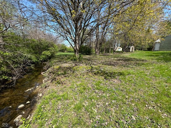 Creek at edge of property, Is overflow from pond behind property. | Image 4