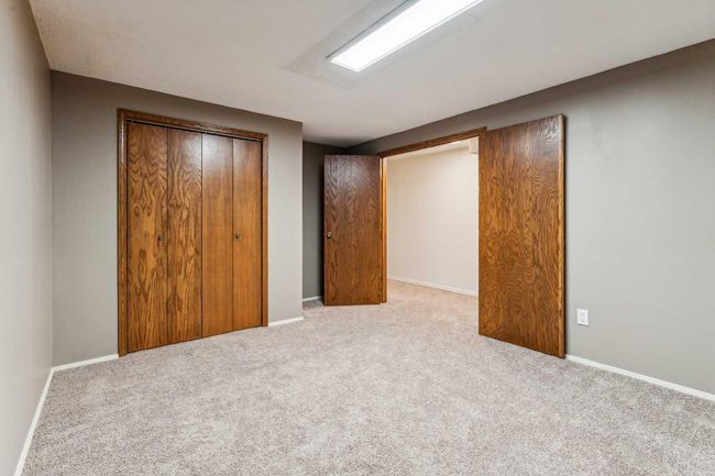 32 Pump Hill Mews Sw, Home with 4 bedrooms, 3 bathrooms and 4 parking in Calgary AB | Image 34