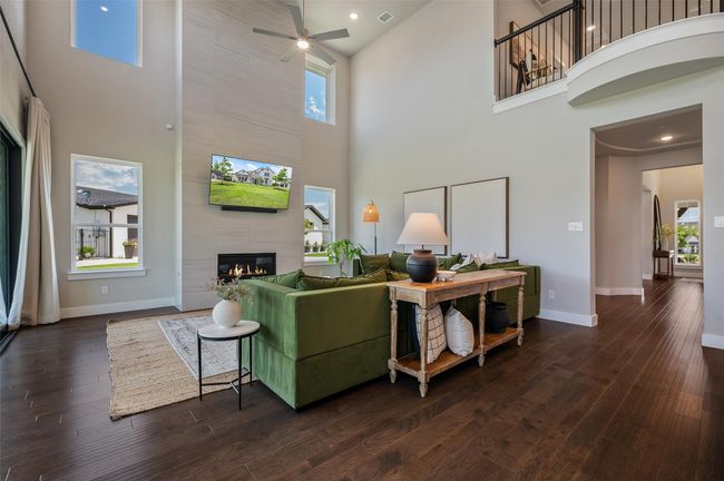 Eyecatching floor to ceiling tile fireplace with flat screen wiring. | Image 4