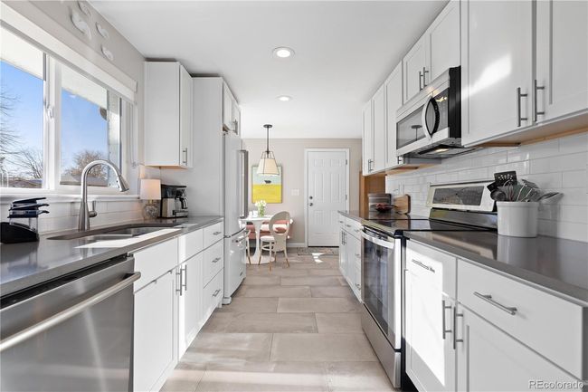 6537 S Lee Ct, House other with 5 bedrooms, 3 bathrooms and 2 parking in Centennial CO | Image 9