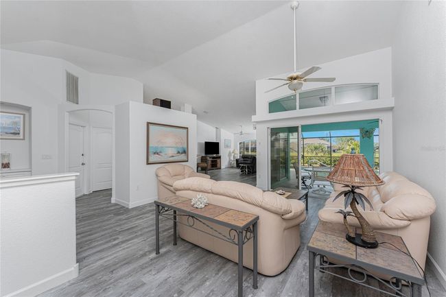Living room area has plenty of room for entertaining | Image 9