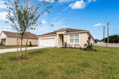 511 Auburn Grove Terrace, House other with 4 bedrooms, 2 bathrooms and null parking in Auburndale FL | Image 2