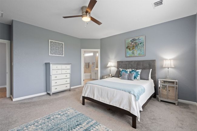 The primary suite allows privacy from the secondary bedrooms. | Image 20