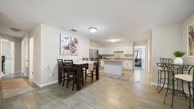 11428 Rustic Pines Cir E, House other with 4 bedrooms, 3 bathrooms and null parking in JACKSONVILLE FL | Image 11