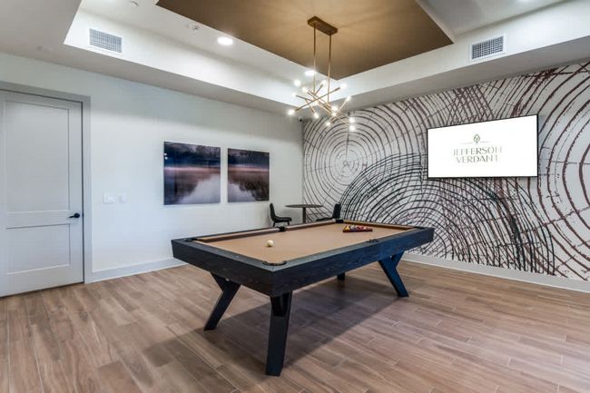 Game room with a tray ceiling, wood-type flooring, and billiards | Image 22