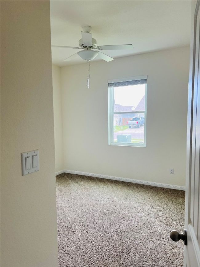 Second of 2 spare bedrooms with spacious double sliding door closet. | Image 15