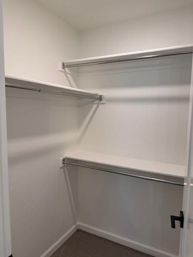 View of spacious closet | Image 36