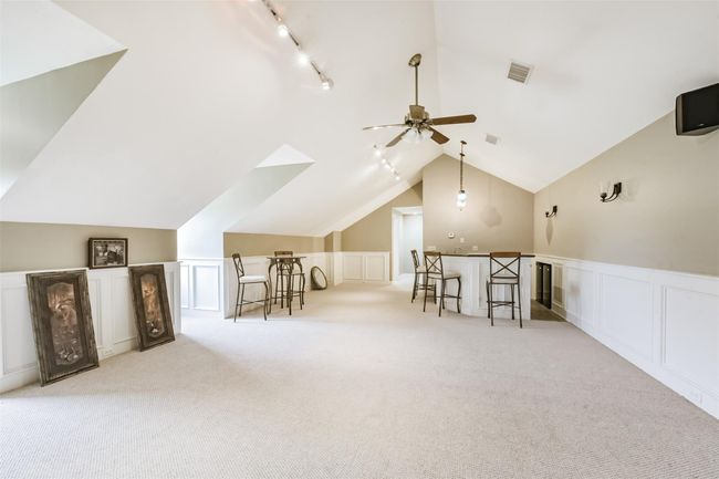 Upstairs game room, wet bar and 2 bar refrigerators, Wired of sound, separate AC controls | Image 31