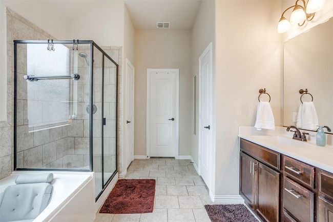 Dual sinks, separate shower. | Image 13