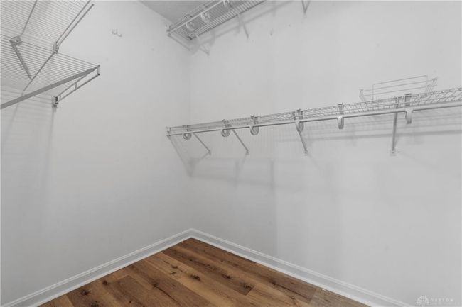 primary bedroom walk in closet | Image 16