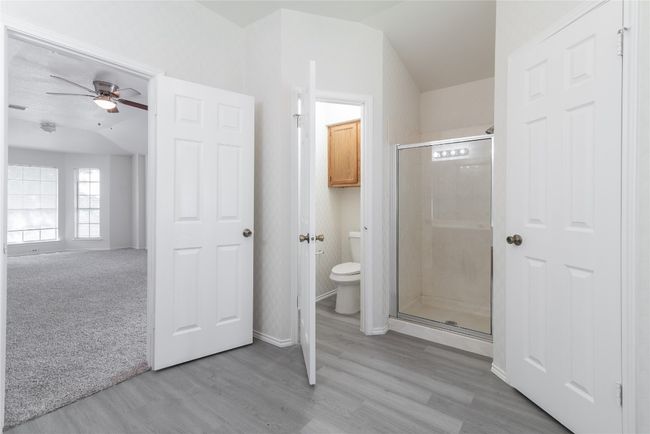 Separate toilet area to the left of the shower | Image 27