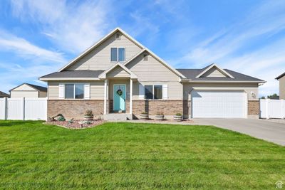 863 S 1250 W, House other with 4 bedrooms, 2 bathrooms and 6 parking in Marriott Slaterville UT | Image 2