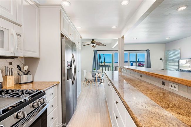 1003 Seal Way, Home with 6 bedrooms, 4 bathrooms and 2 parking in Seal Beach CA | Image 13