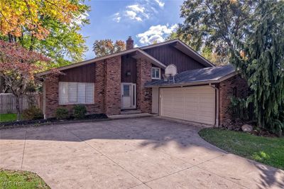 View of front of home featuring a garage | Image 1