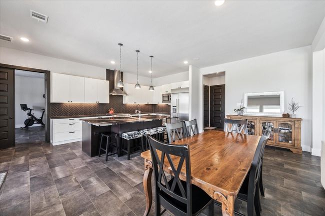 Imported Italian tile throughout. | Image 9