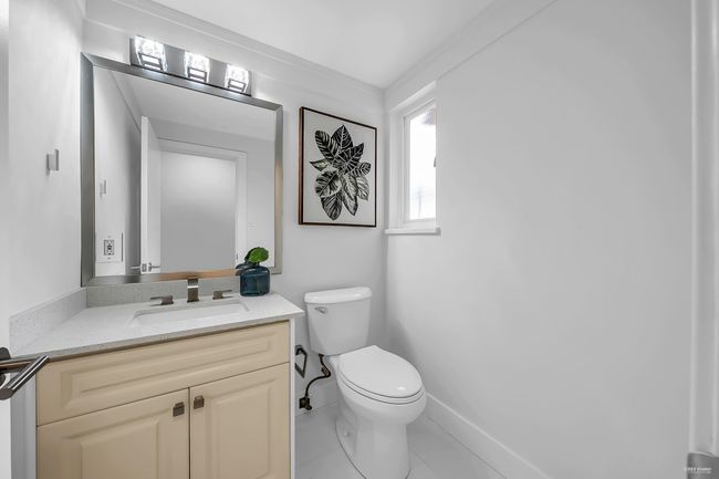 Bathroom featuring vanity and tile patterned flooring | Image 30