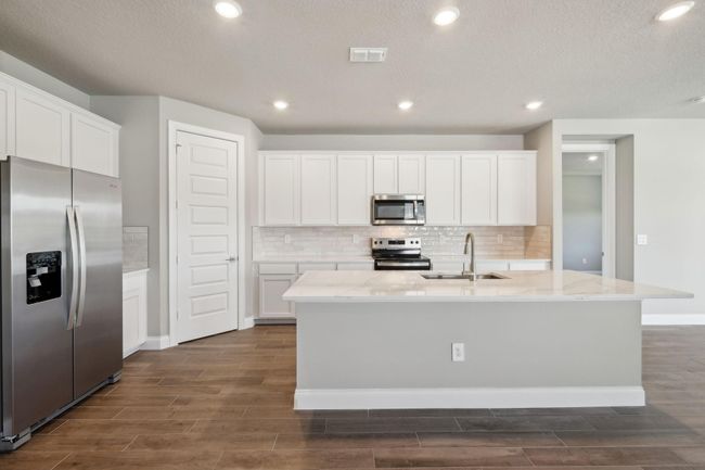 9041 Dahlia Cir, House other with 4 bedrooms, 3 bathrooms and null parking in Port St. Lucie FL | Image 10