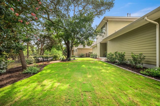 With ample room for pets to roam, the backyard provides the perfect space for furry friends to play and explore, all while enjoying the peaceful surroundings | Image 36