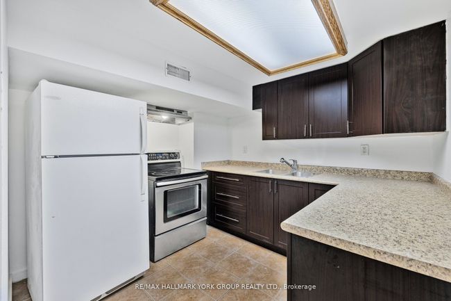 LOWER - 103 Micmac Cres, House attached with 2 bedrooms, 1 bathrooms and 1 parking in North York ON | Image 6