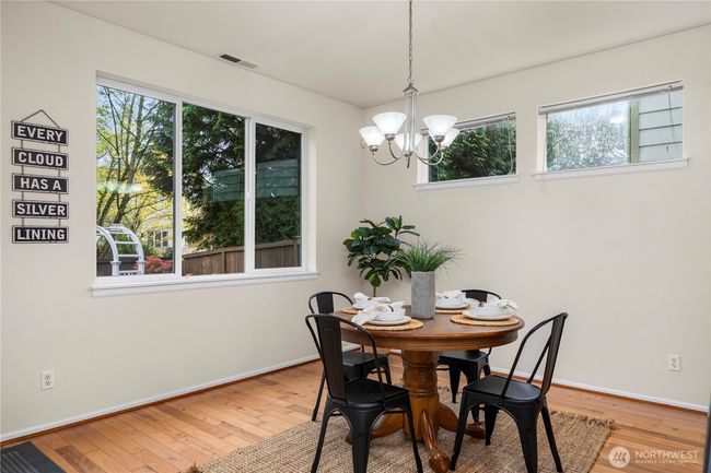 sprawling kitchen/dining area flows seamlessly out to the back patio and into the large living room! | Image 15