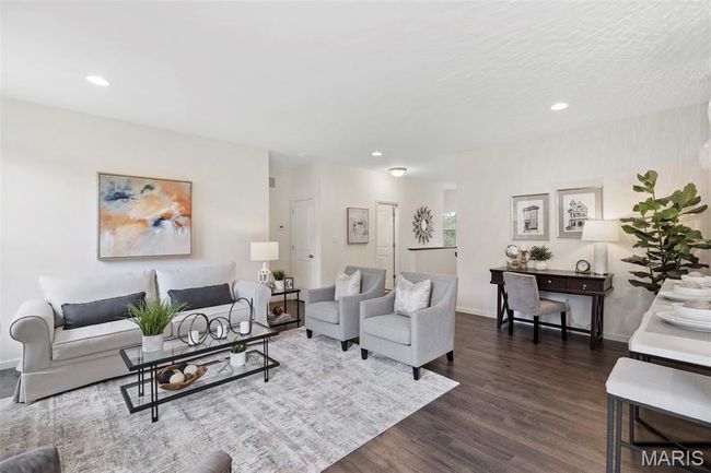 Living room with dark wood-type flooring, recessed lighting, and baseboards | Image 13